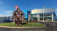 10-foot Bigfoot inflatable character displayed in front of a dealership