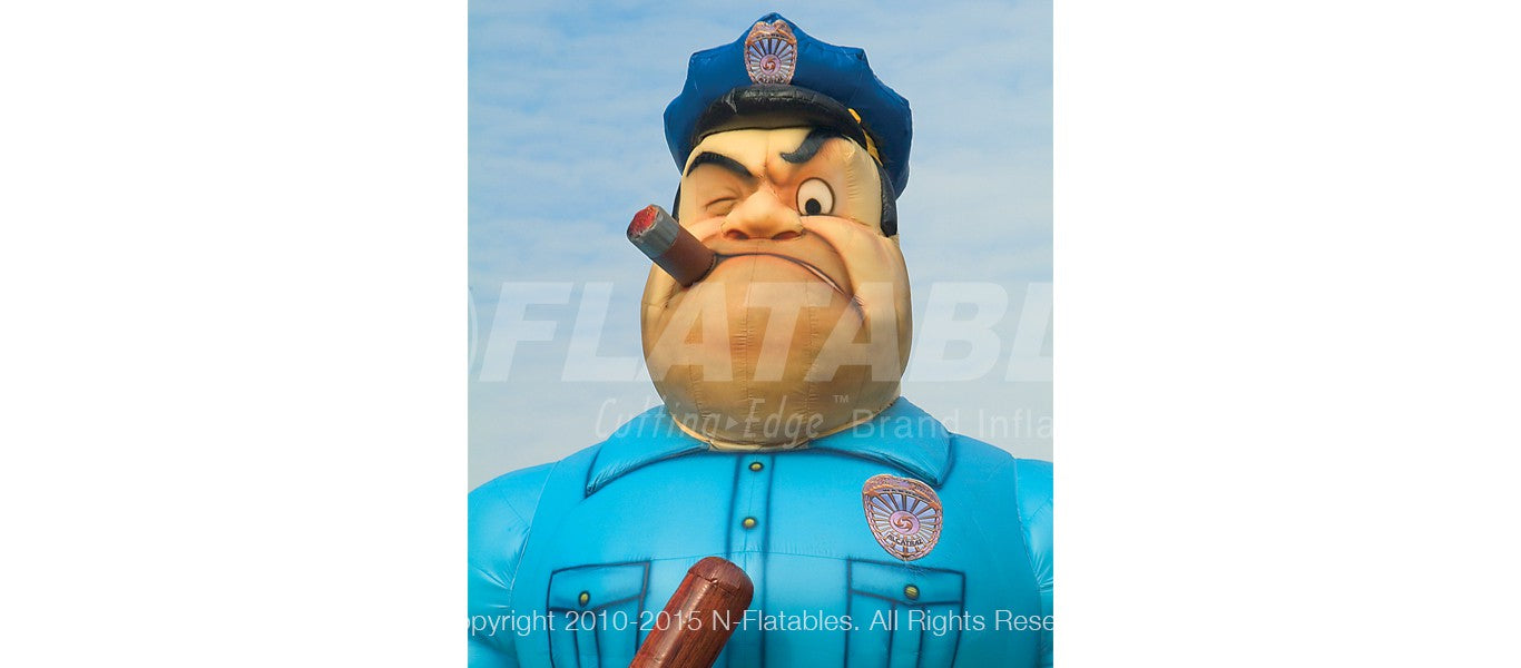 Closeup of a cartoon inflatable prison guard. 