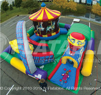 Little girl climbing up the inflatable circus train crawl through in the Amusement Park toddler play area.