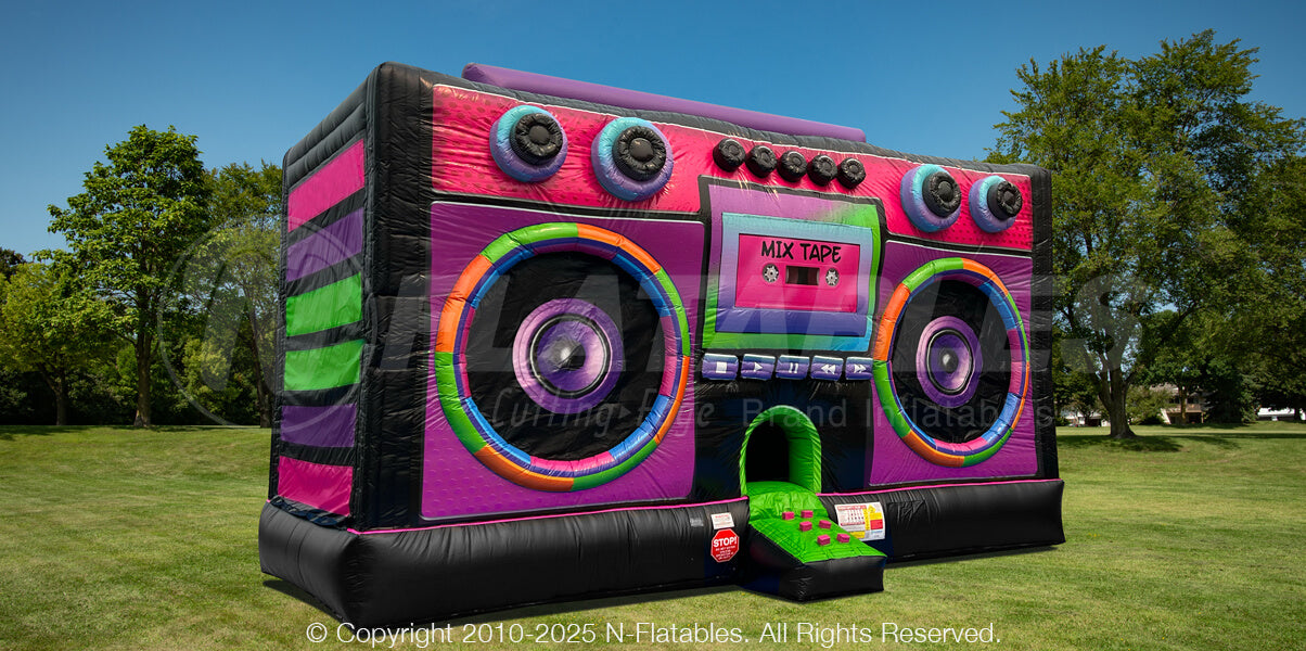 Boom Box Blacklight Bouncer setup outside on grass
