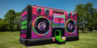 Boom Box Blacklight Bouncer setup outside on grass