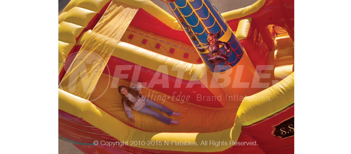 View of the Buccaneer™ commercial grade inflatable combo sliding area. 