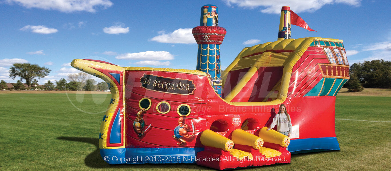 Buccaneer™ pirate ship themed commercial grade inflatable bouncer combo set up in an outdoor park. 