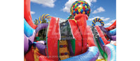 Climbing ramp on the Candy Fun Center inflatable playground with gumball machine and candy design elements