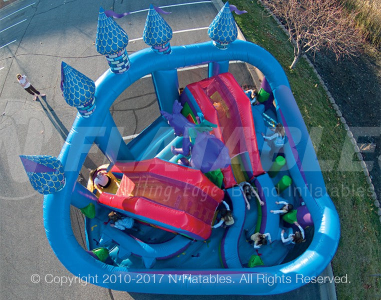 Overhead view of the Castle Fun Centre™ Kid Combo showing inflatable obstacles, slides, and bounce areas. 