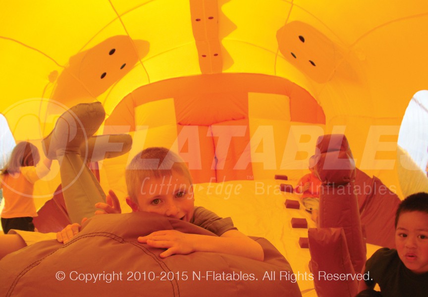 Inside view of the Dragon Hide-n-Slide™ inflatable combo with kids playing