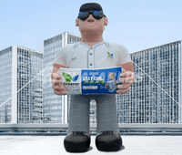 30' tall inflatable service technician character holding a billboard on a rooftop. 