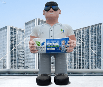 30' tall inflatable service technician character holding a billboard on a rooftop. 