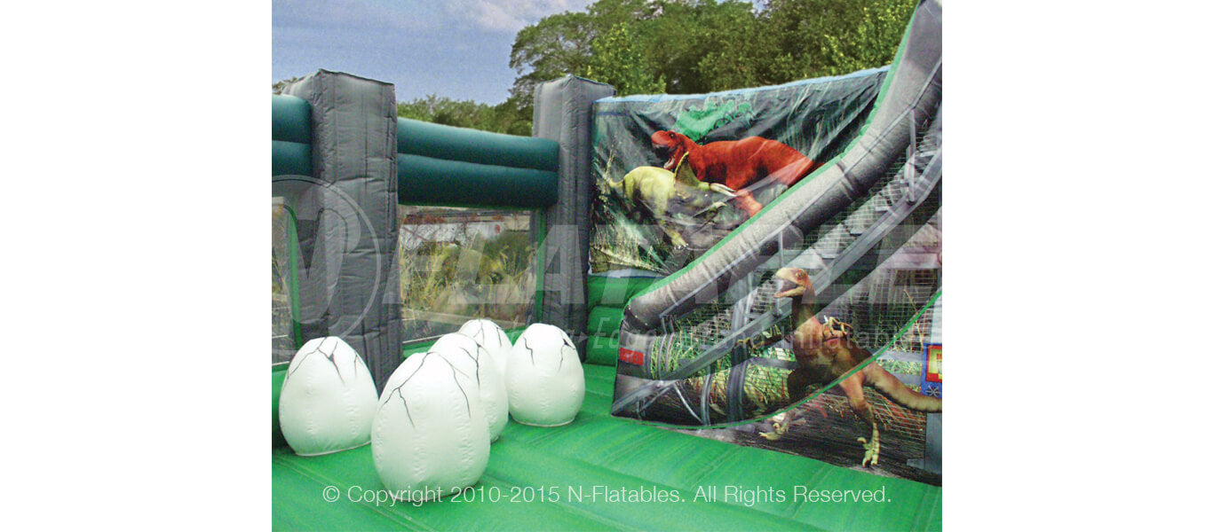 Jurassic Zoo™  commercial inflatable bounce house featuring giant inflatable dinosaur eggs about to hatch