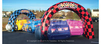 Back view of the Kiddy Grand Prix inflatable tunnel with a series of race cars and start and finish lines. 