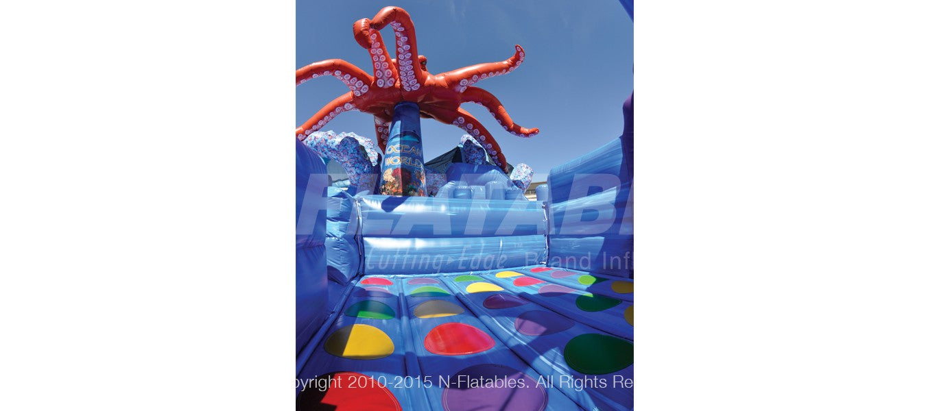 Bounce area of the Ocean World inflatable playground featuring a colorful 3D octopus character. 