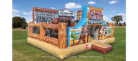 Quarter view of the Old West Playland™ toddler play area set up at a park