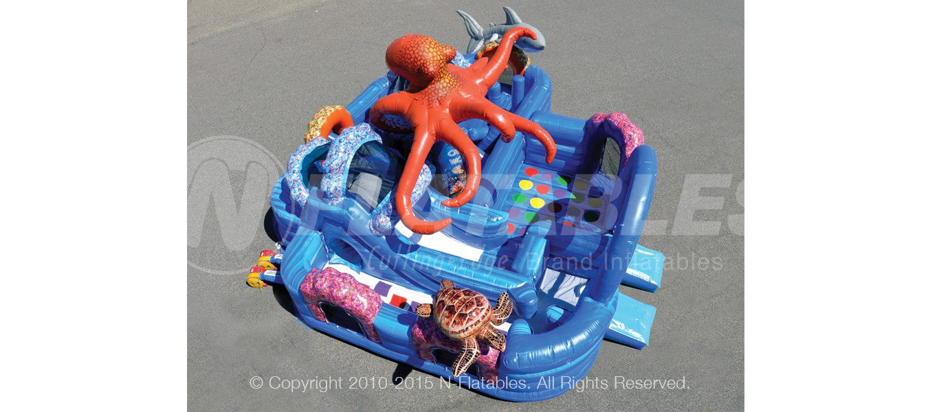 Aerial view of the Ocean World combo showing inflatable bouncing area, obstacles, and slide. 