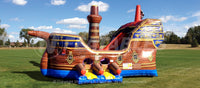 Side view of the Pirate Ship™ inflatable combo set up outdoors. 