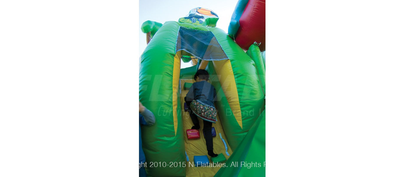 Kid climbing up the Rainforest Fun Center™ Kid Combo