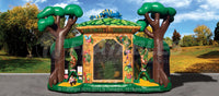 Front view of the Rainforest Fun Center™ combo decorated with inflatable jungle trees and a chameleon. 