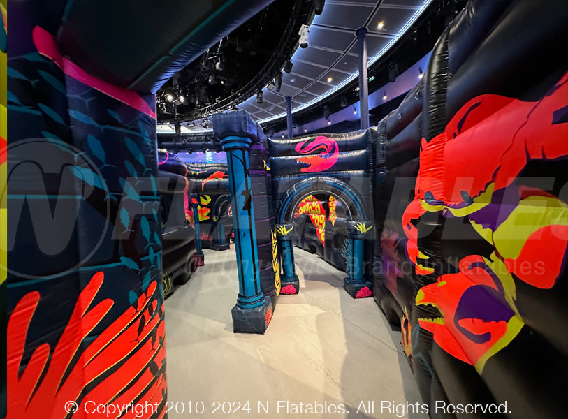 The inside of a sea-themed inflatable laser tag maze with a crab character printed. 