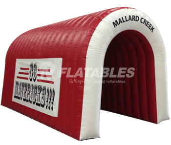 Red and white inflatable tunnel for sports team with custom branding
