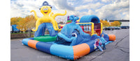 Corner view of the Sea Park inflatable play area for toddlers with a happy smiling inflatable octopus and whale