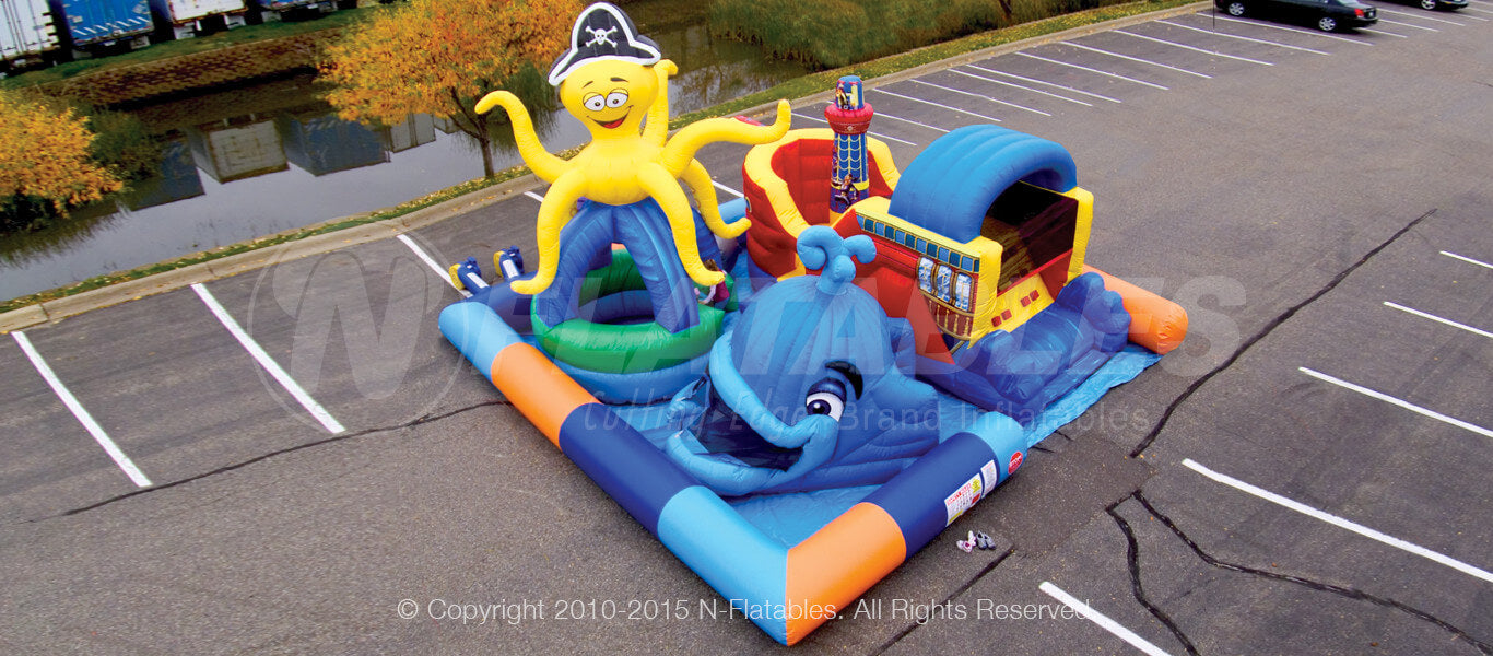 Overhead view of the Sea Park inflatable play area for toddlers with pirate ship, octopus ball pit, and whale. 