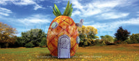 29' inflatable replica of spongebob's pineapple house set up in a park.  
