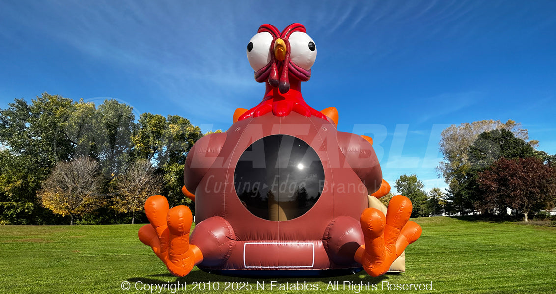 20-foot inflatable turkey bounce house setup in a park