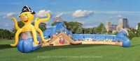 Under the Sea aquarium themed inflatable crawl through for kids in a park setting. 