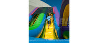 A kid climbing up the Wacky Slide Combo™ commercial inflatable playground.